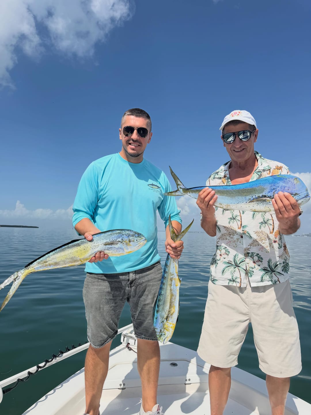 Alex and Misha with their limit of Mahi today